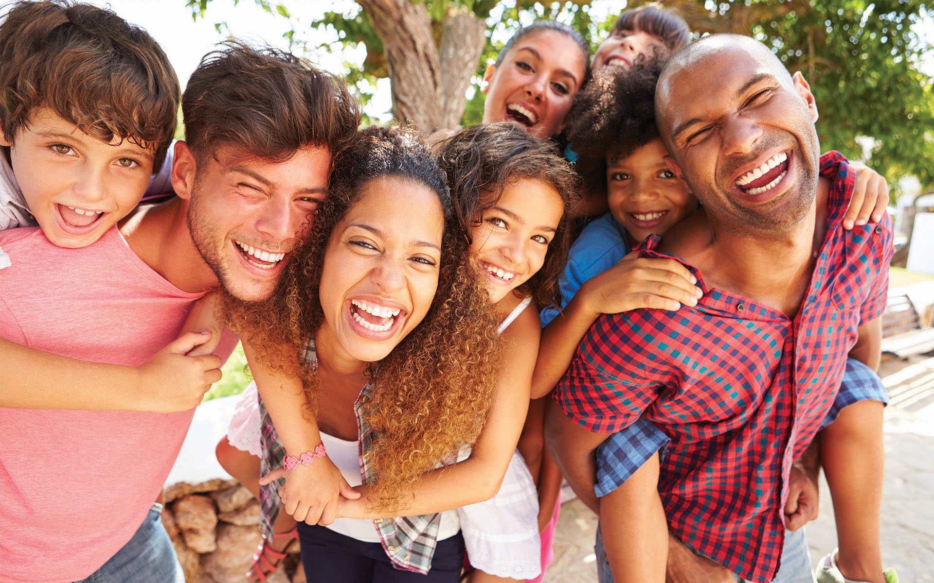 A modern dental practice with a blue and white chair, a dental treatment table, and medical equipment.